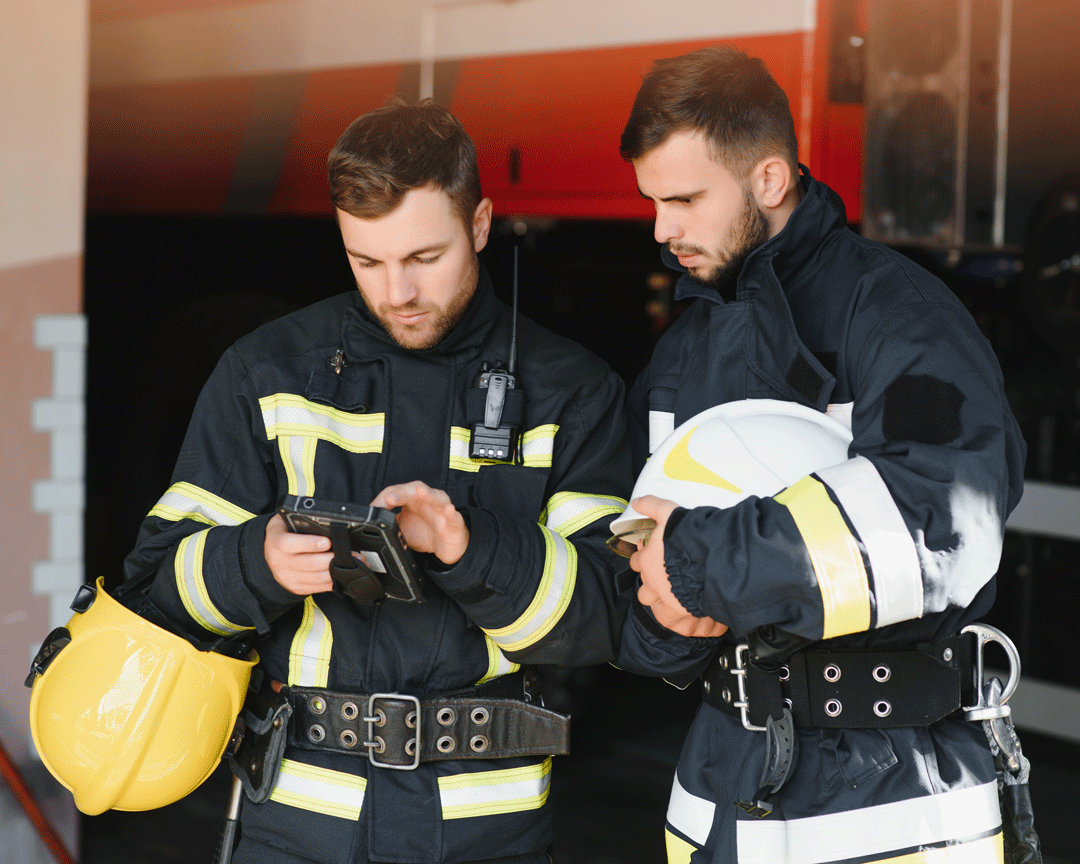 two-professional-firefighters-with-uniforms-and-pr-2025-03-16-02-28-14-utc two-professional-firefighters-with-uniforms-and-pr-2025-03-16-02-28-14-utc