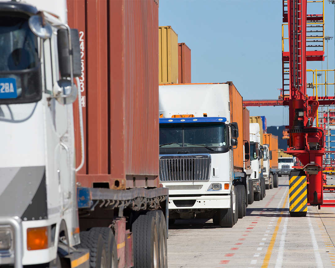 1_0003_shipping-trucks-awaiting-transport-at-shipping-yar-2026-03-26-09-06-51-utc.jpg 1_0003_shipping-trucks-awaiting-transport-at-shipping-yar-2026-03-26-09-06-51-utc.jpg